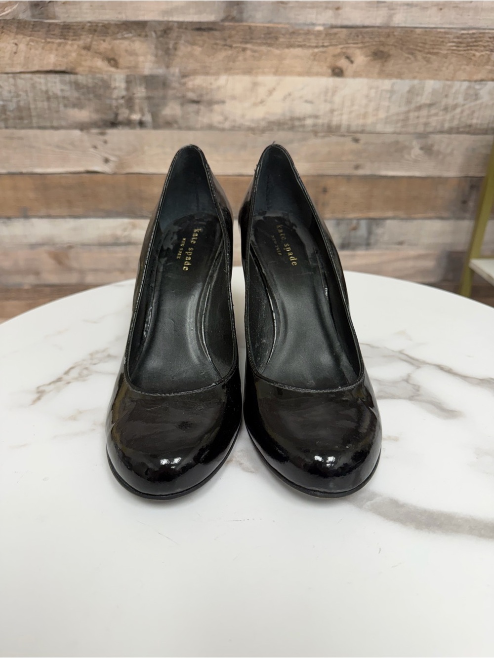 Kate Spade black leather wedge pump 7.5